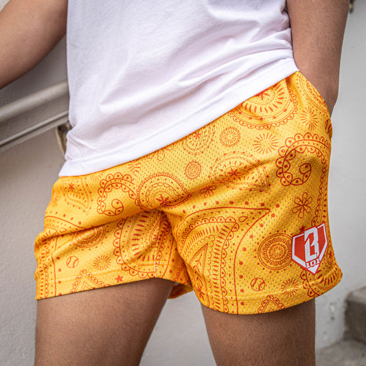 Orange paisley pattern shorts