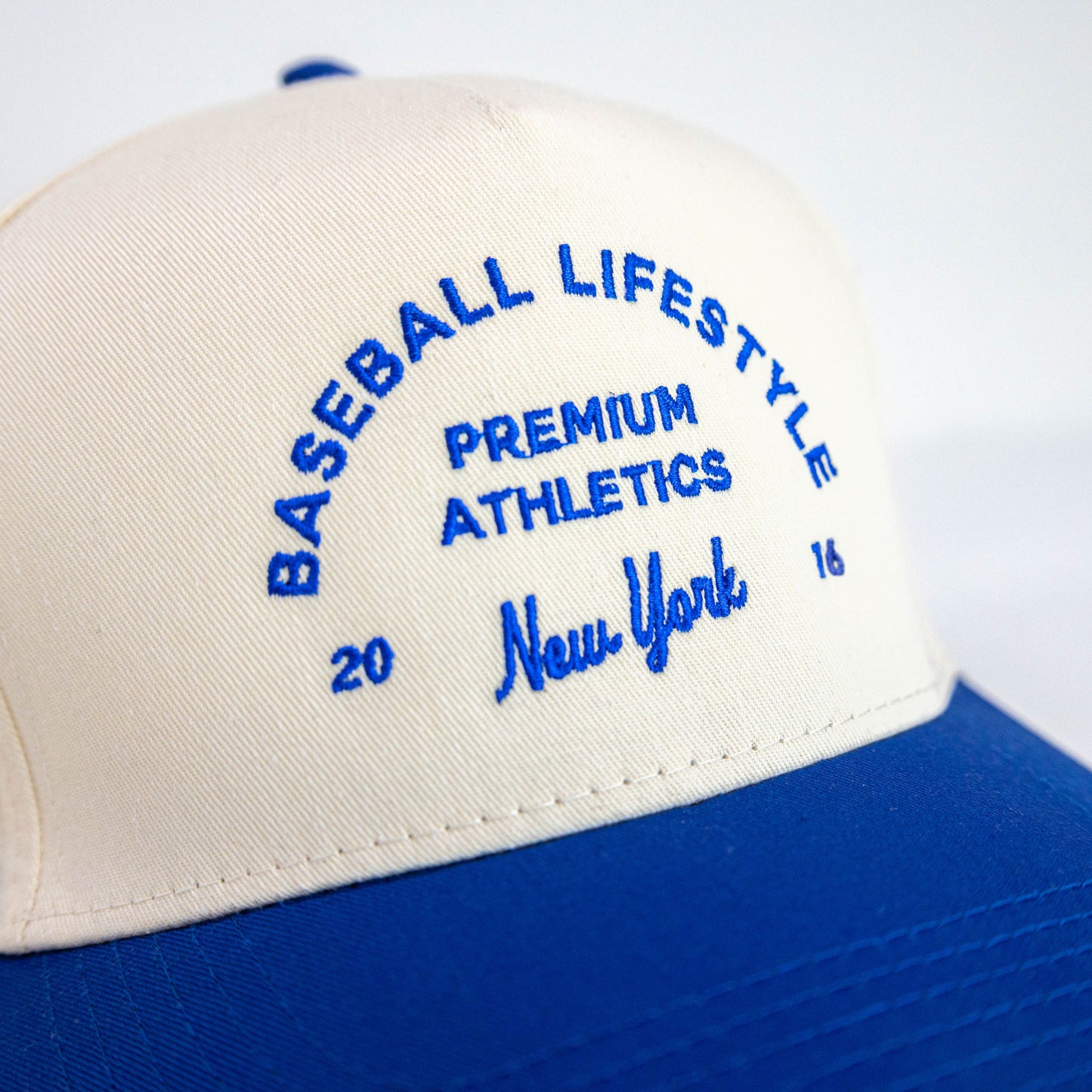 Premium Athletics Snapback Hat - Cream/Blue