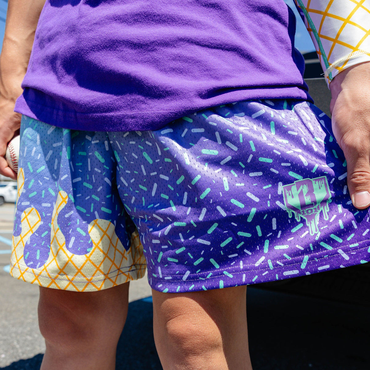 Adult model wearing ice Cream Galaxy Grape shorts
