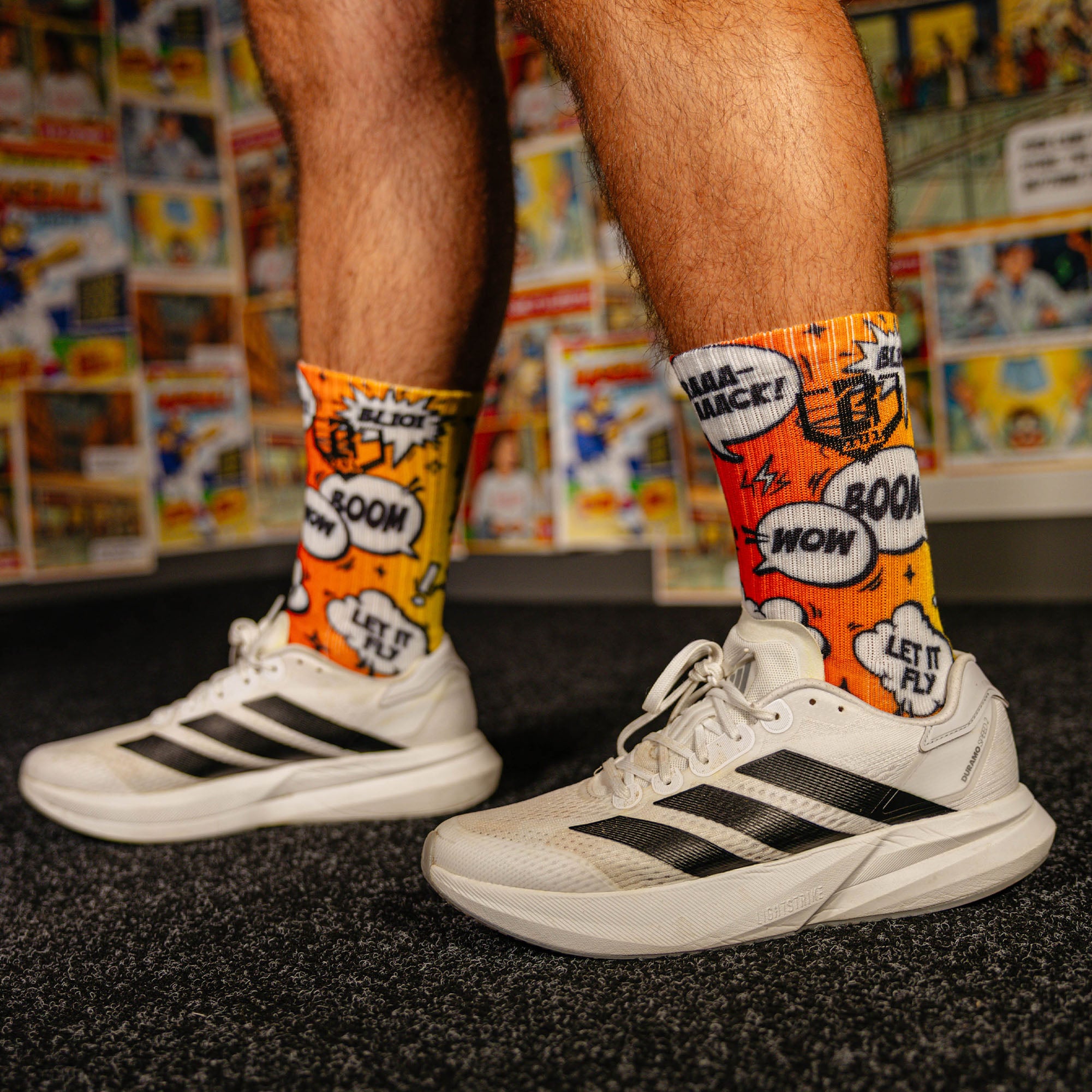 Multi-Color socks with "BL101 Comic Performance 3-Pack" design — product view