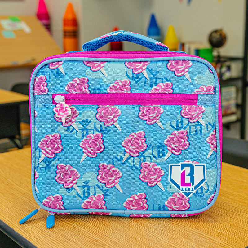 Adult model wearing multi-color lunch box with "Cotton Candy SZN 2" design