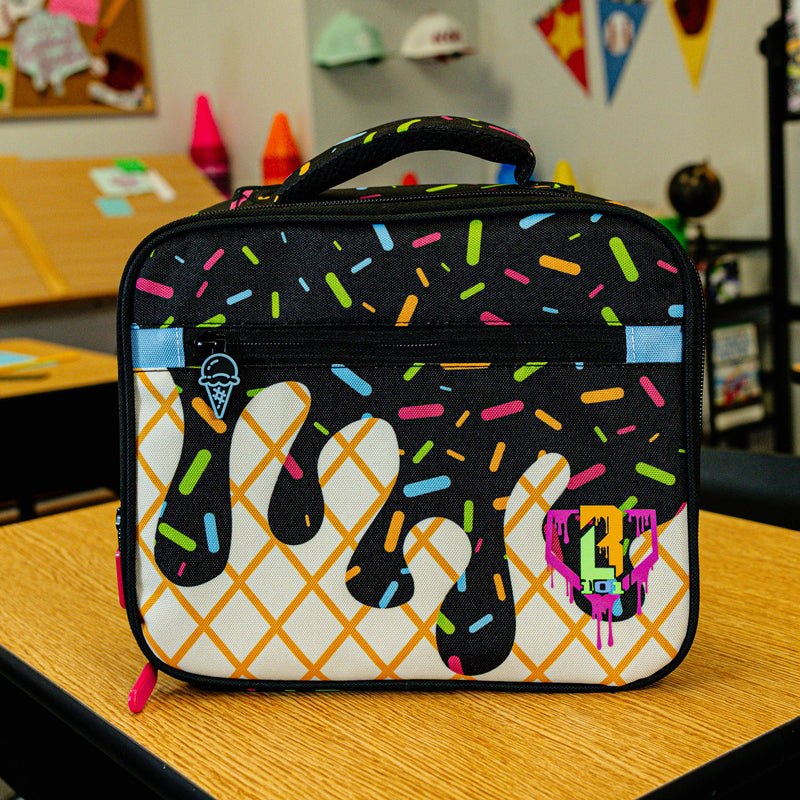 Adult model wearing black lunch box with "Midnight Sundae SZN 2" design