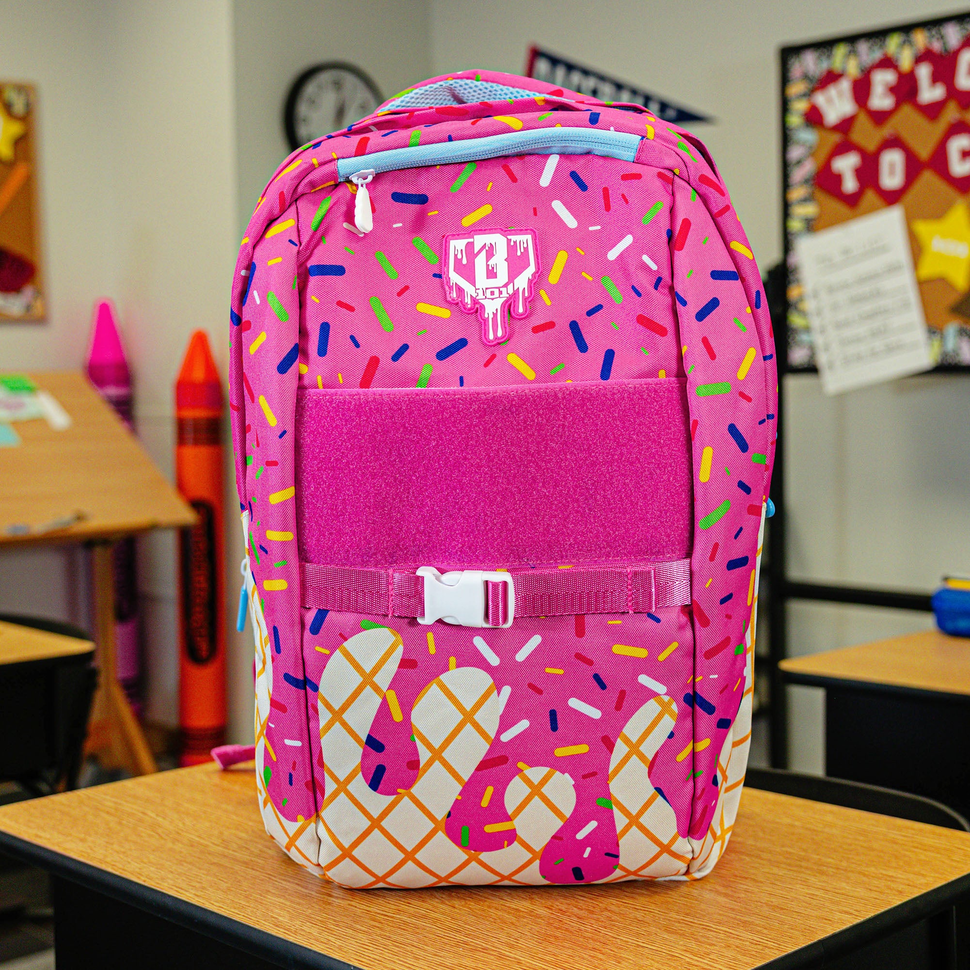 Pink backpack with "Strawberry Ice Cream  SZN 2" design — back view