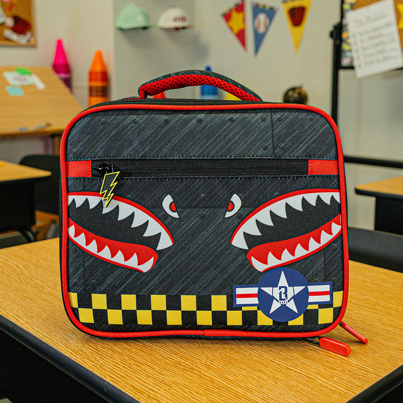Adult model wearing multi-color lunch box with "Unit 101 SZN 2" design