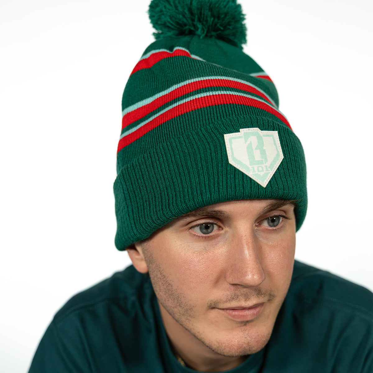 Green beanie with "Stitched For The SZN Beanie" design