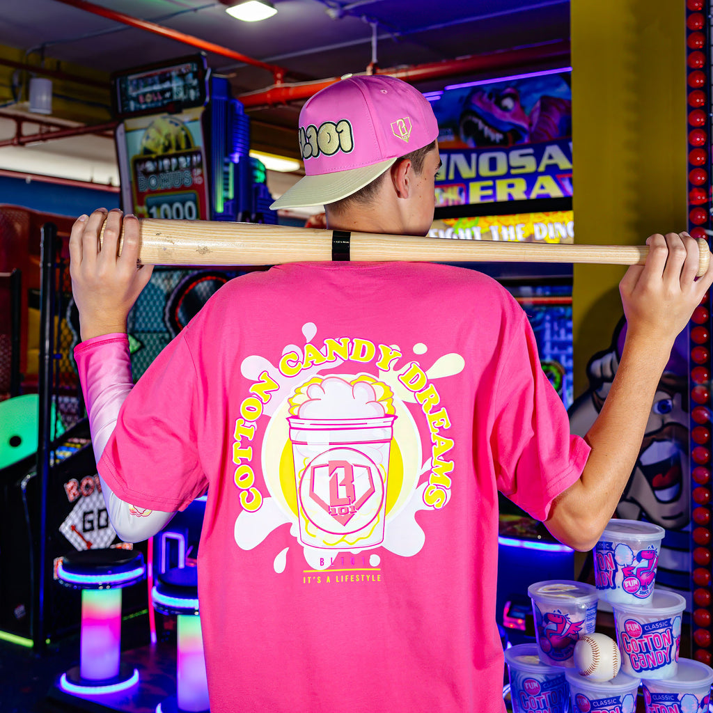 Youth model wearing Cotton Candy Pink Lemonade youth arm sleeve