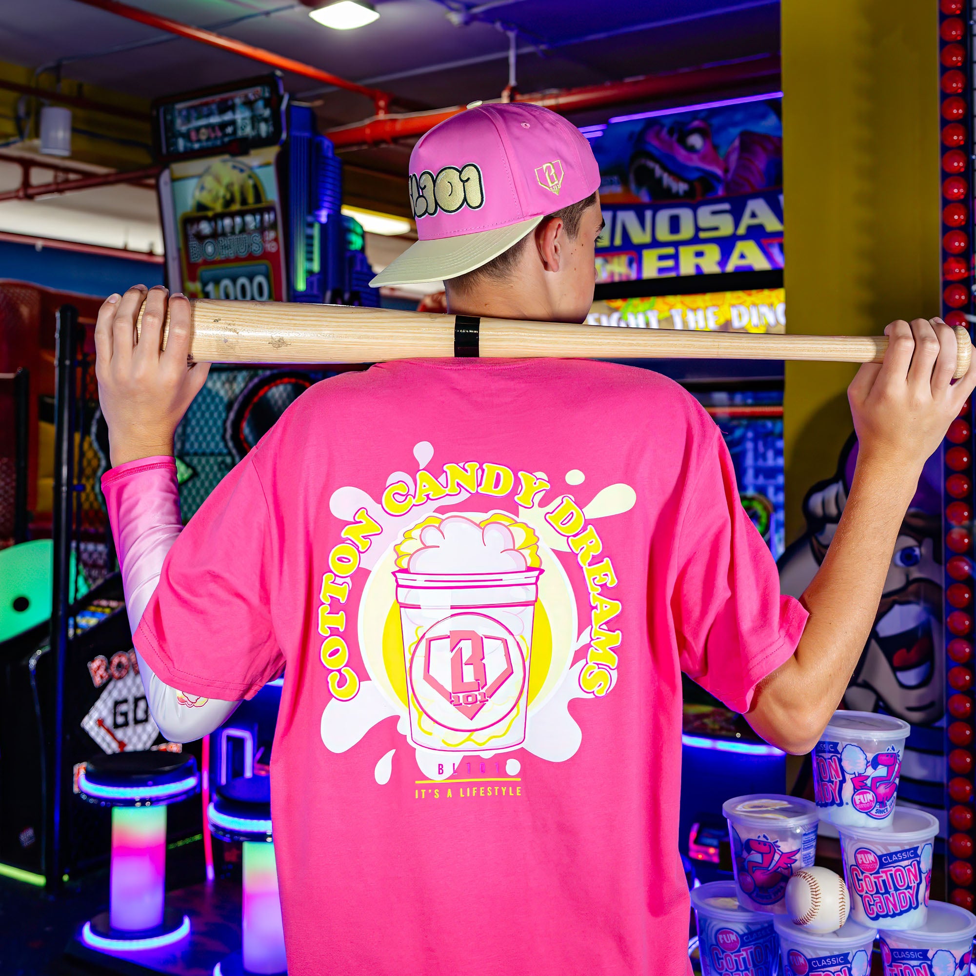 Youth model wearing Cotton Candy Pink Lemonade youth arm sleeve