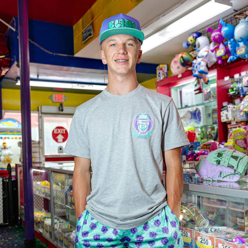 Adult model wearing Cotton Candy Galaxy Grape hat