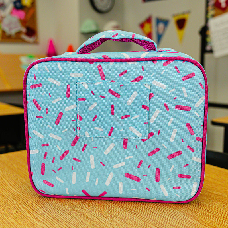 Adult model wearing blue lunch box with "Cotton Candy Ice Cream  SZN 2" design