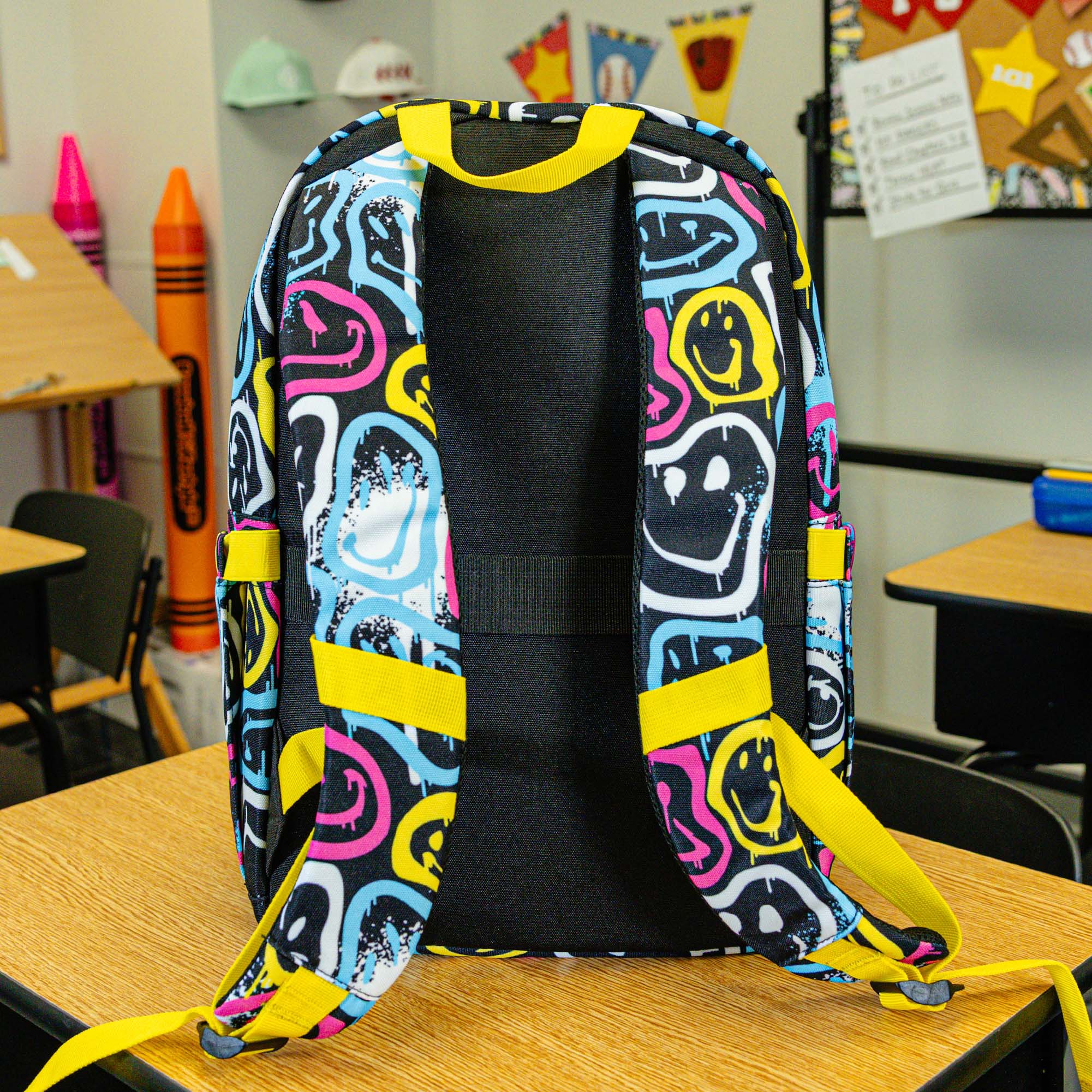 Multi-Color backpack with "Smiley Slugger Rotation" design — back view
