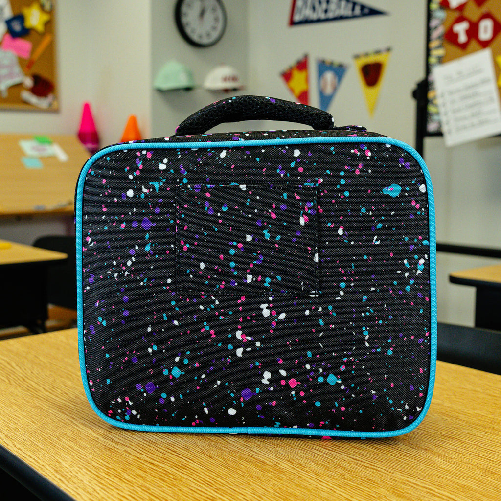 Adult model wearing black lunch box with "Splatter SZN 2" design