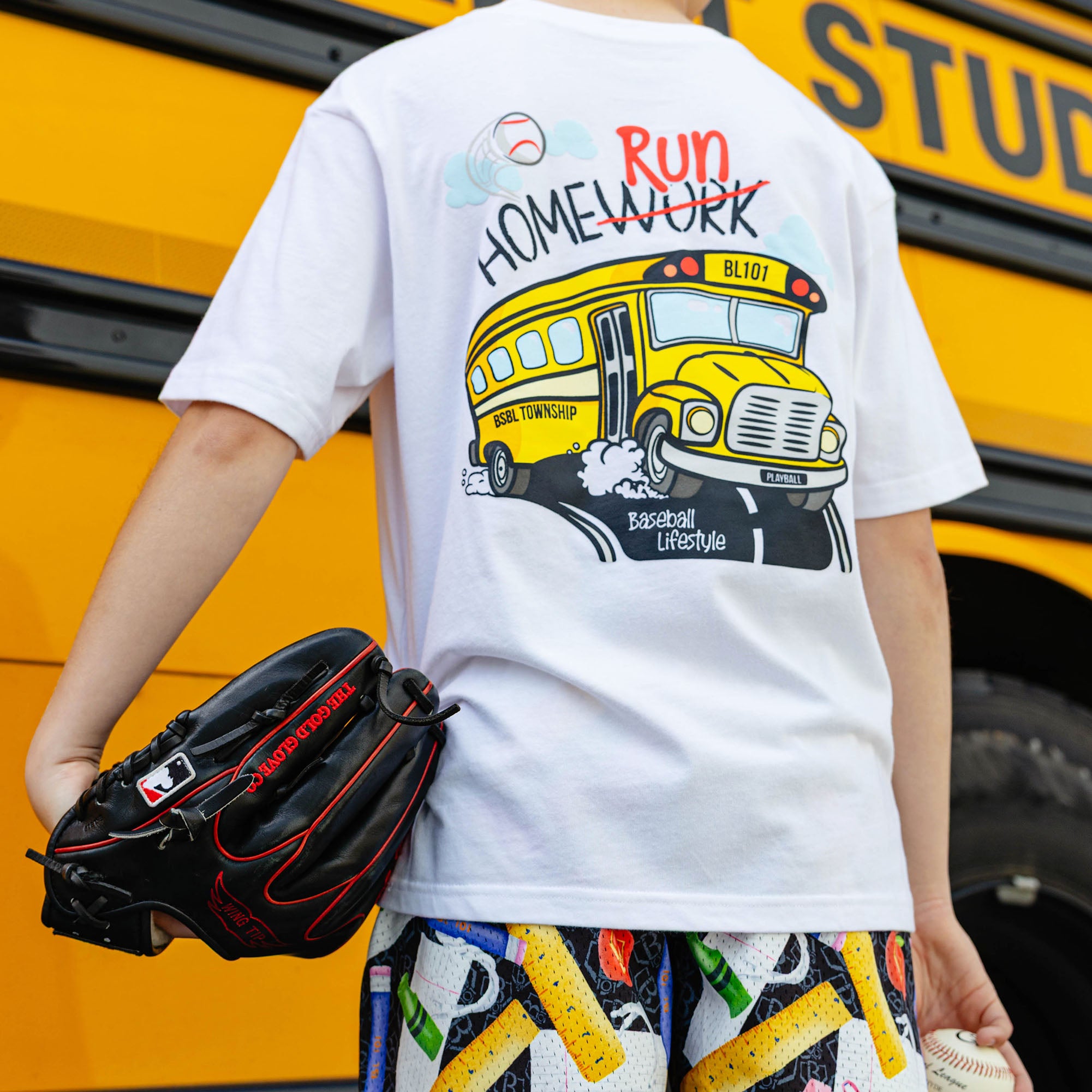 Youth model wearing white youth item