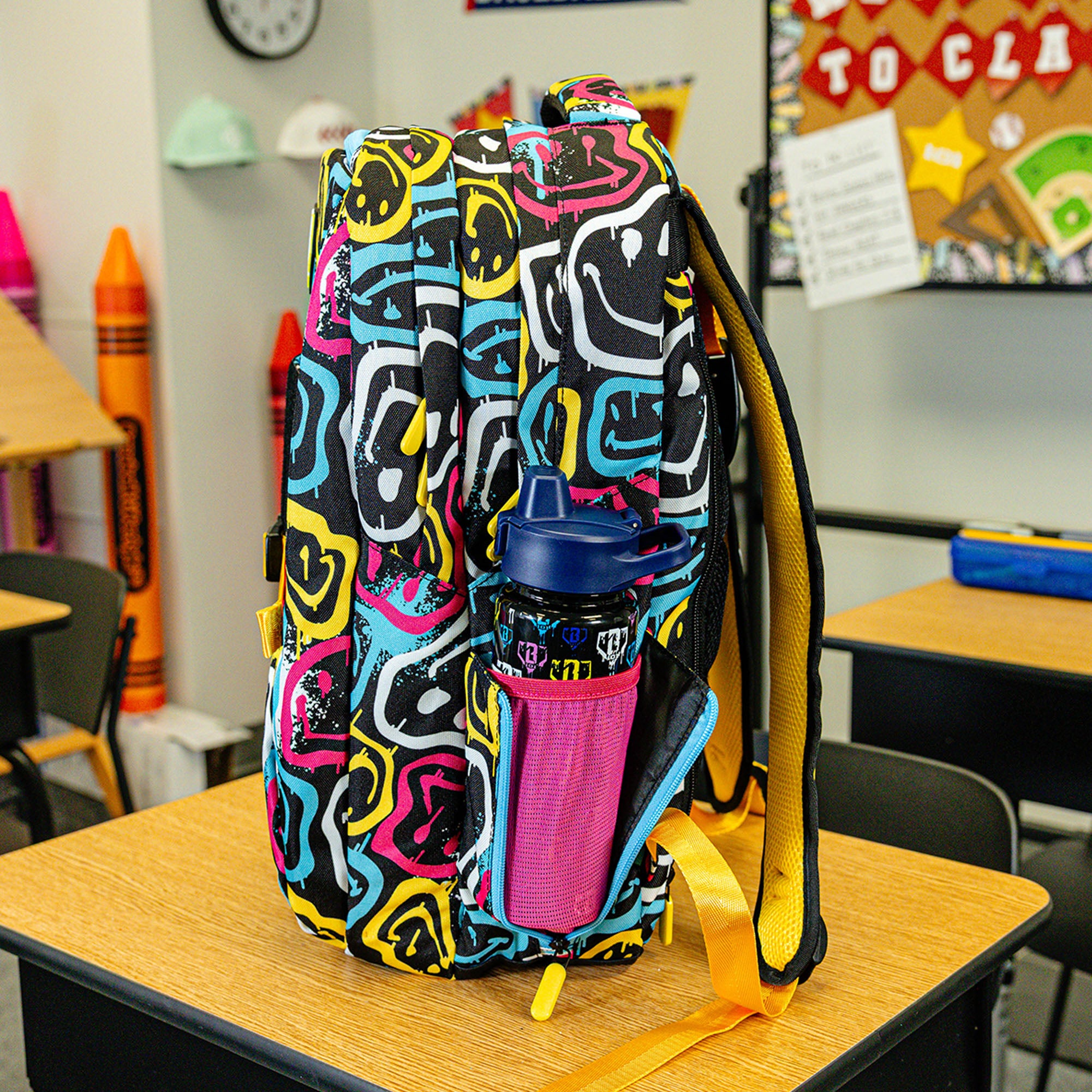 Multi-Color backpack with "Smiley Slugger SZN 2" design — back view