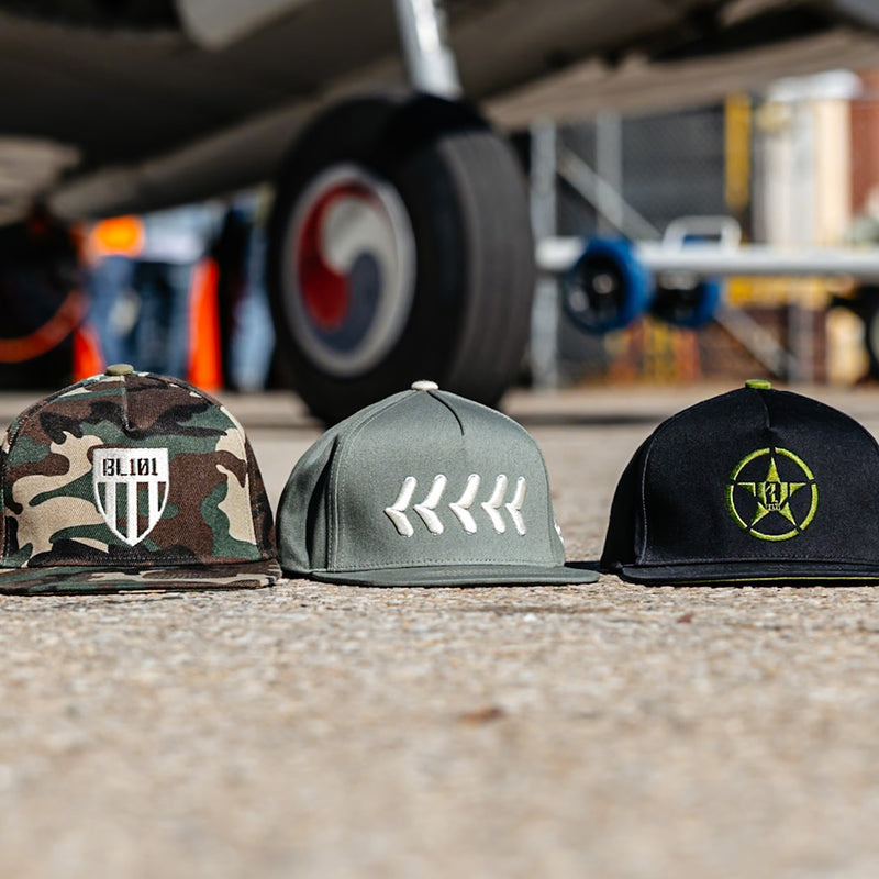 Olive green snapback hat with white embroidered baseball seam stitch design and BL101 logo on the side

Army green snapback hat with white embroidered baseball seam stitch design 

Black snapback hat with neon green embroidered baseball seam stitch design 
