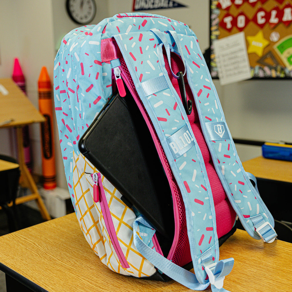 Blue backpack with "Cotton Candy Ice Cream  SZN 2" design — back view
