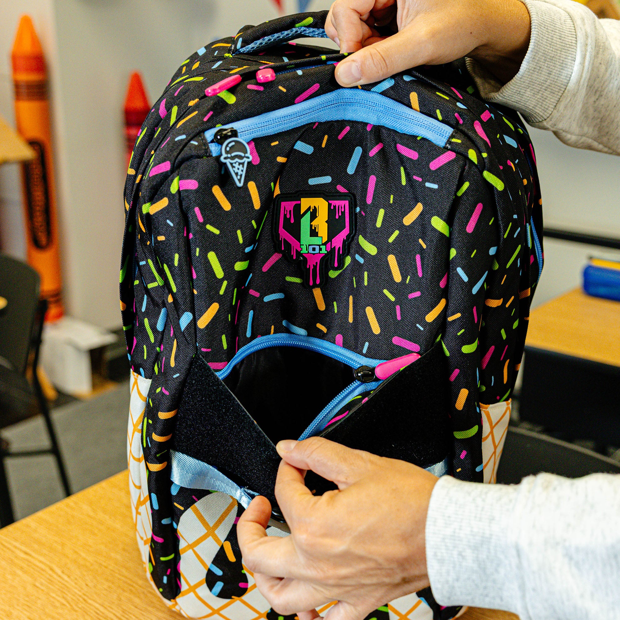 Black backpack with "Midnight Sundae SZN 2" design — back view