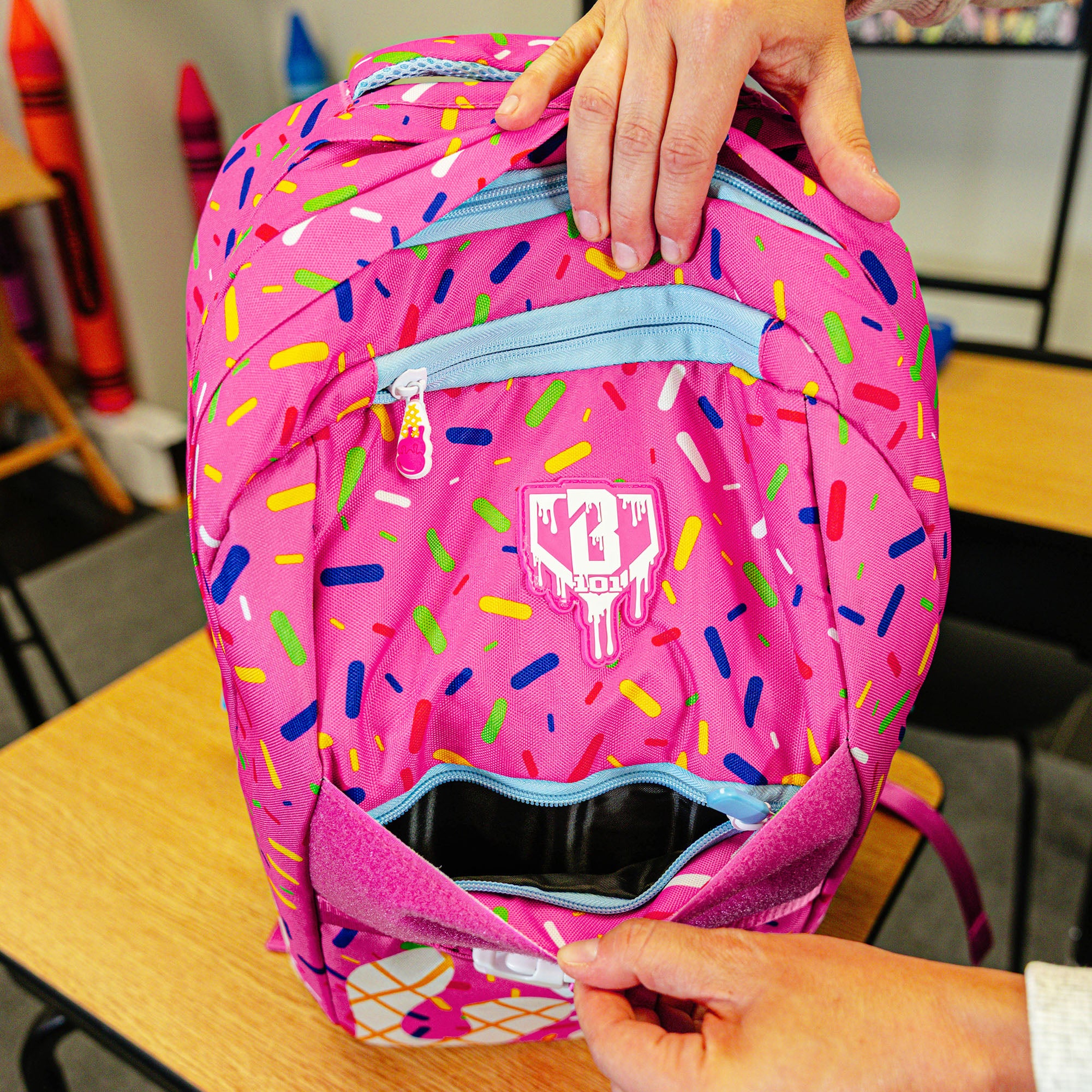 Pink backpack with "Strawberry Ice Cream  SZN 2" design — back view