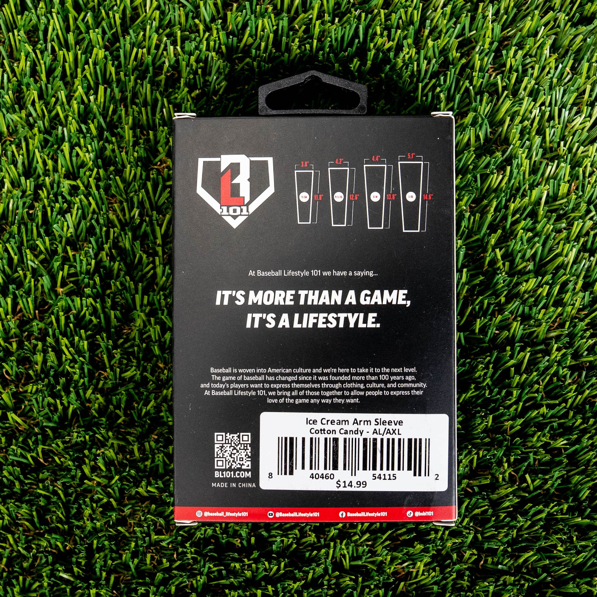  Back of the BL101 arm sleeve retail box on green turf showing size chart brand tagline and Ice Cream Arm Sleeve Cotton Candy barcode label priced at 14.99