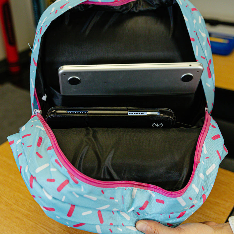 Blue backpack with "Cotton Candy Ice Cream  SZN 2" design — back view