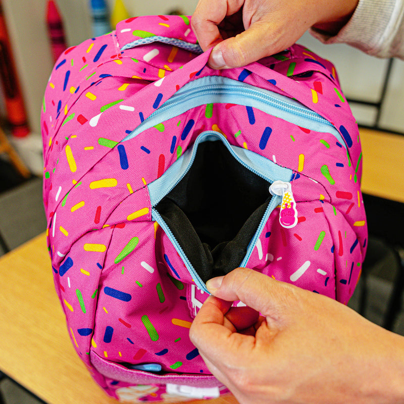 Pink backpack with "Strawberry Ice Cream  SZN 2" design — back view