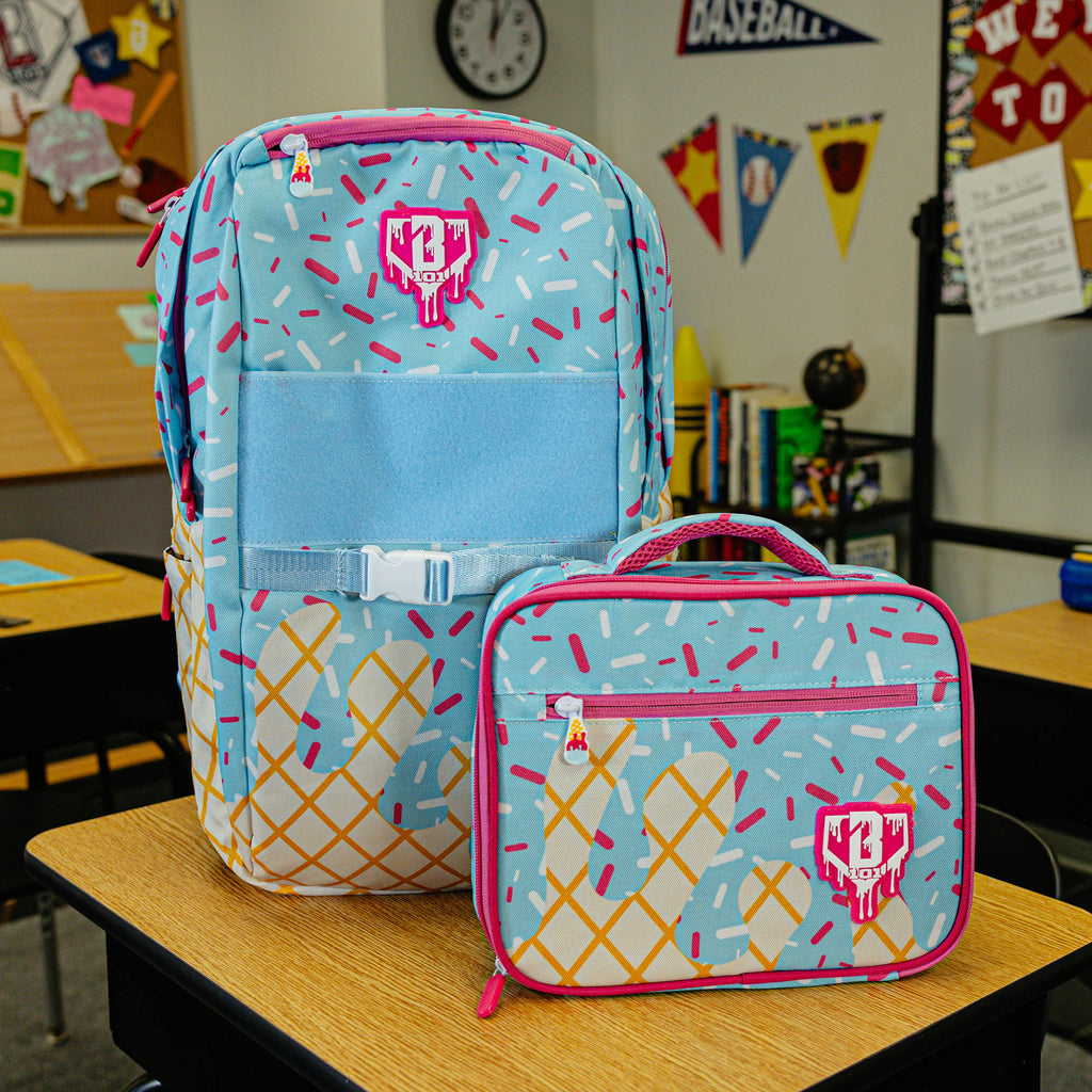 Blue backpack with "Cotton Candy Ice Cream  SZN 2" design — back view