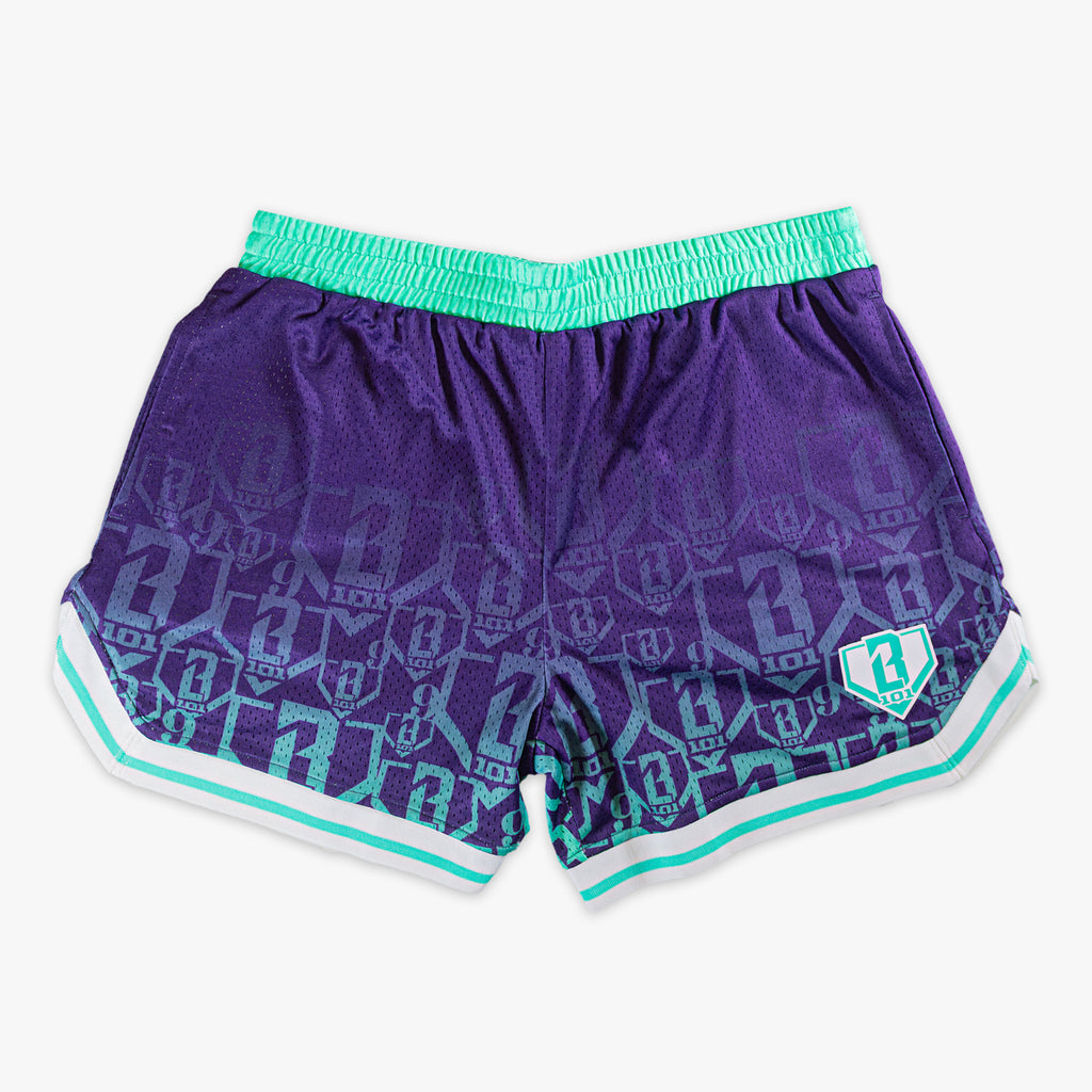 Purple shorts with green and white trim and gradient BL101 logos on a white background