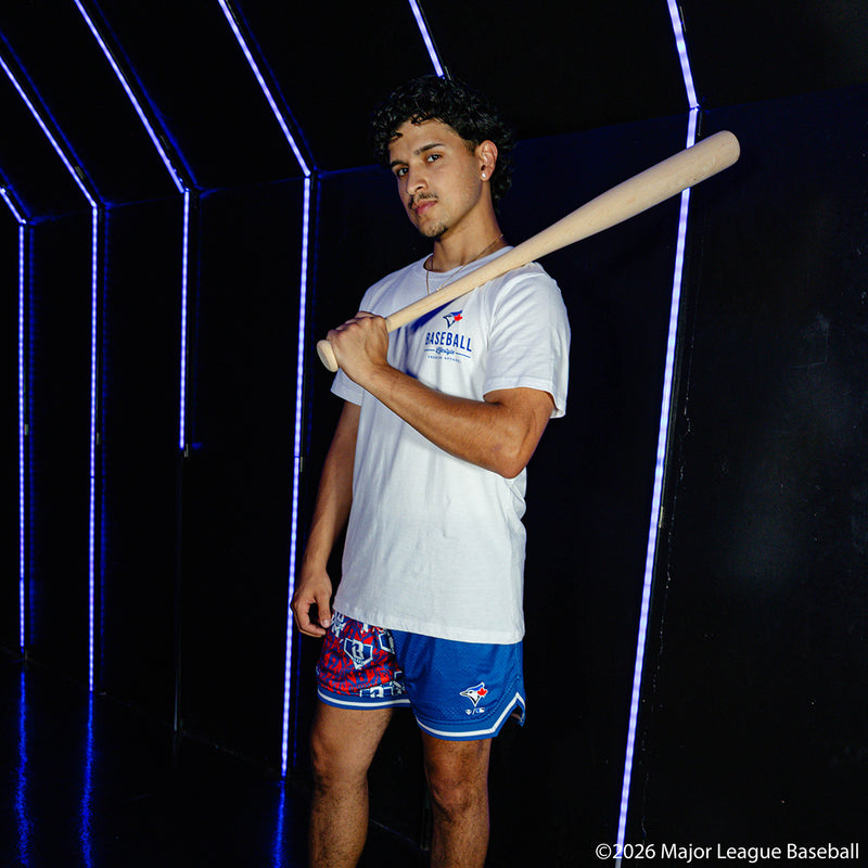 Adult model wearing blue shorts with "Toronto Blue Jays Sticker Court" design