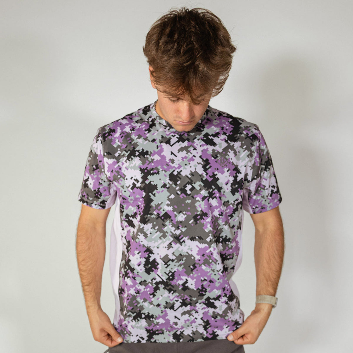 Adult model wearing multi-color Digi Camo Diamond Tech vented tee