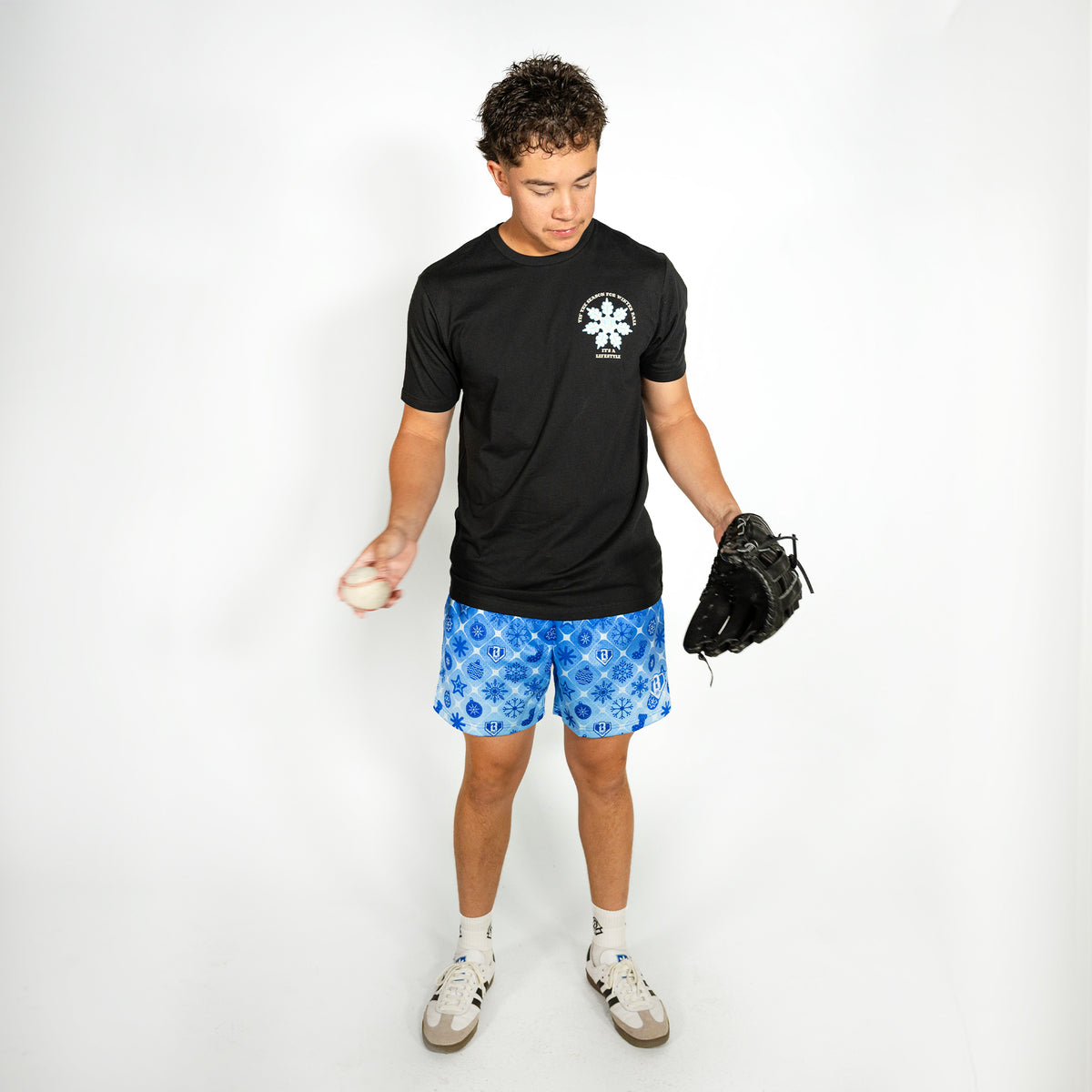 Adult model wearing blue shorts with "Frozen Diamond" design