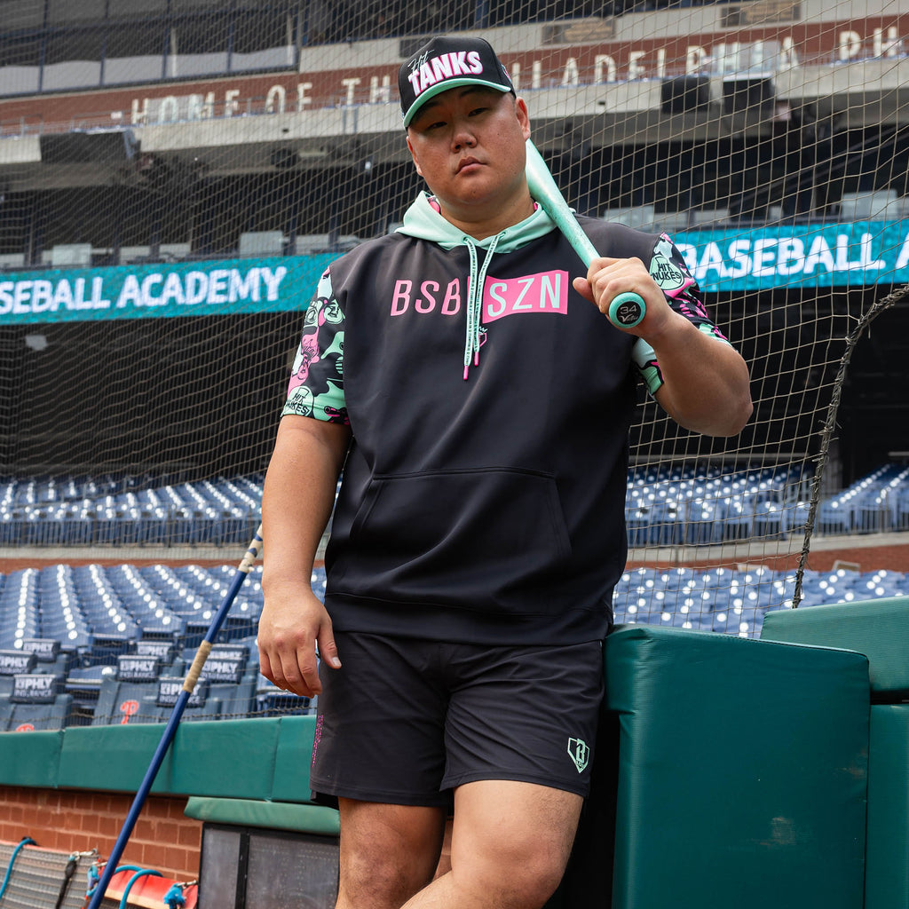 Adult model wearing black shorts with liner with "King Of JUCO Pro Series V2" design