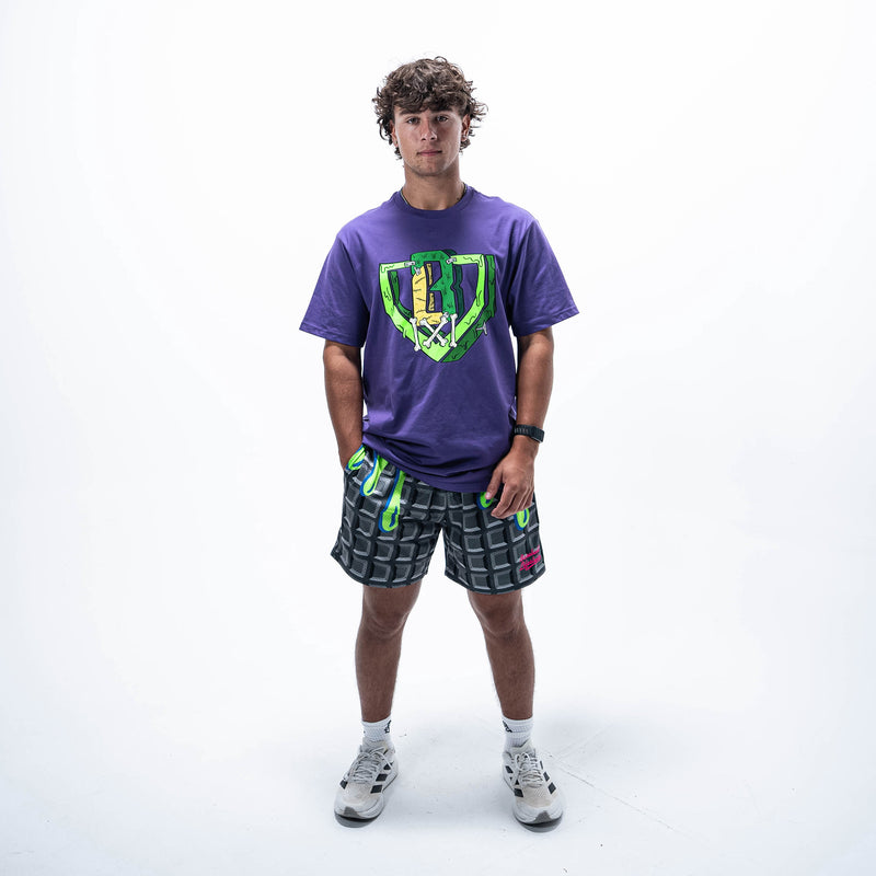 Adult model wearing black shorts with "Spooky SZN Waffle" design