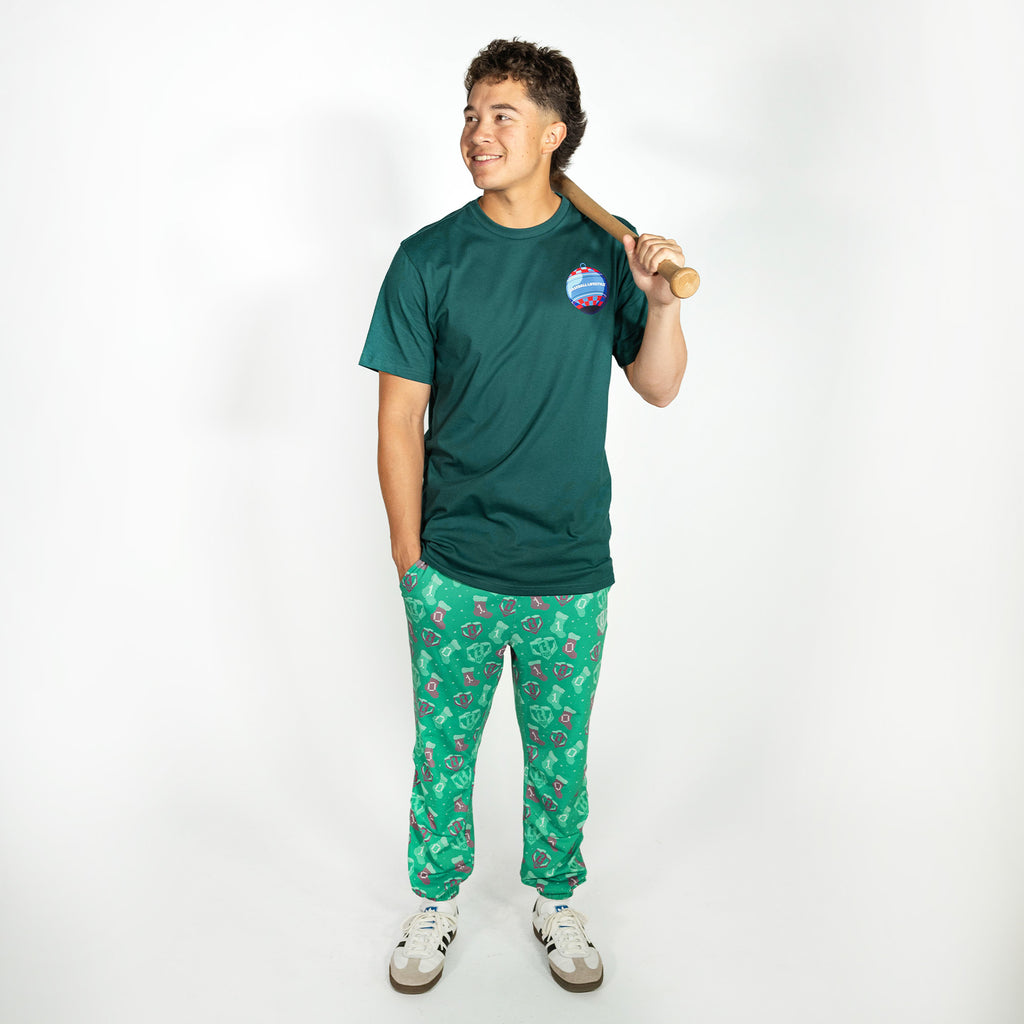 Adult model wearing green Stitched For The SZN pajama pants