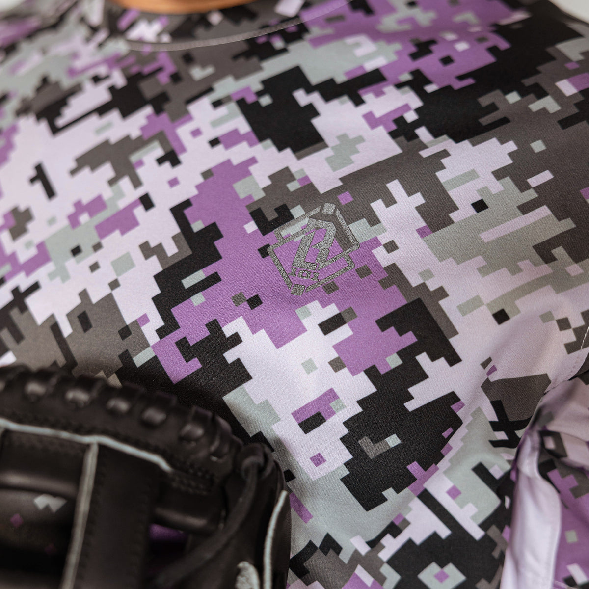 Adult model wearing multi-color Digi Camo Diamond Tech vented tee