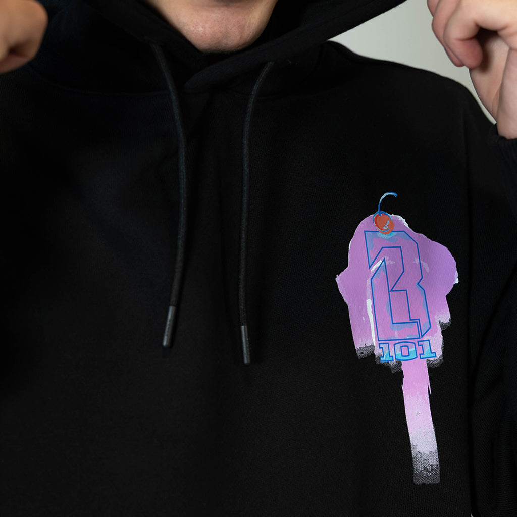 Adult model wearing black hoodie with "Fastball Scoops" design