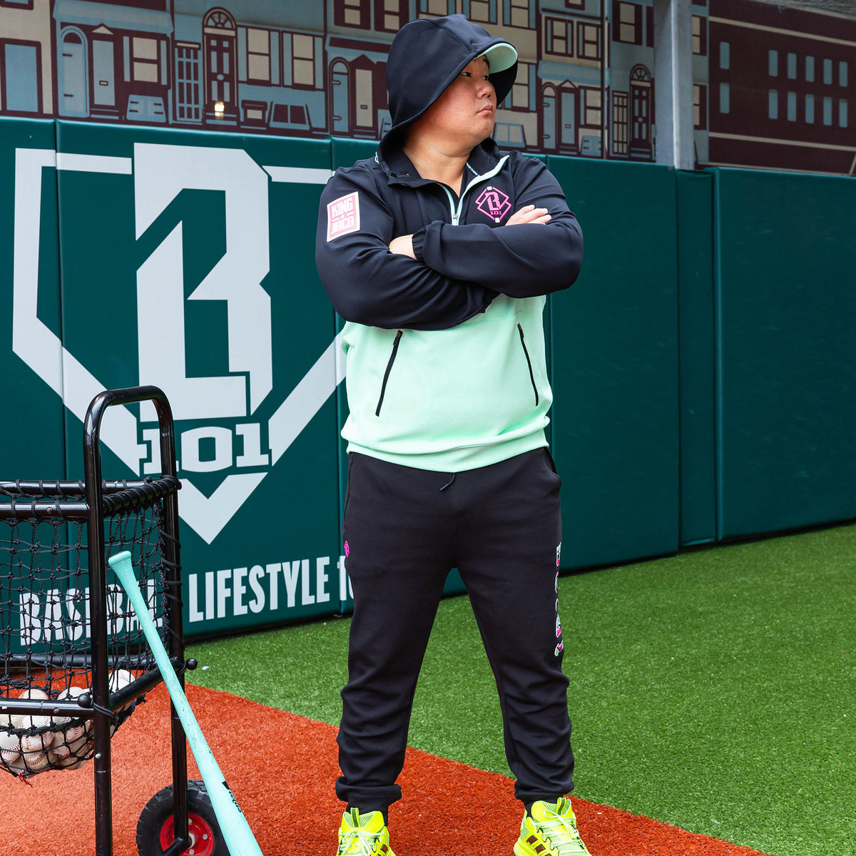 Adult model wearing black relaxed fit joggers with "King Of JUCO Diamond" design
