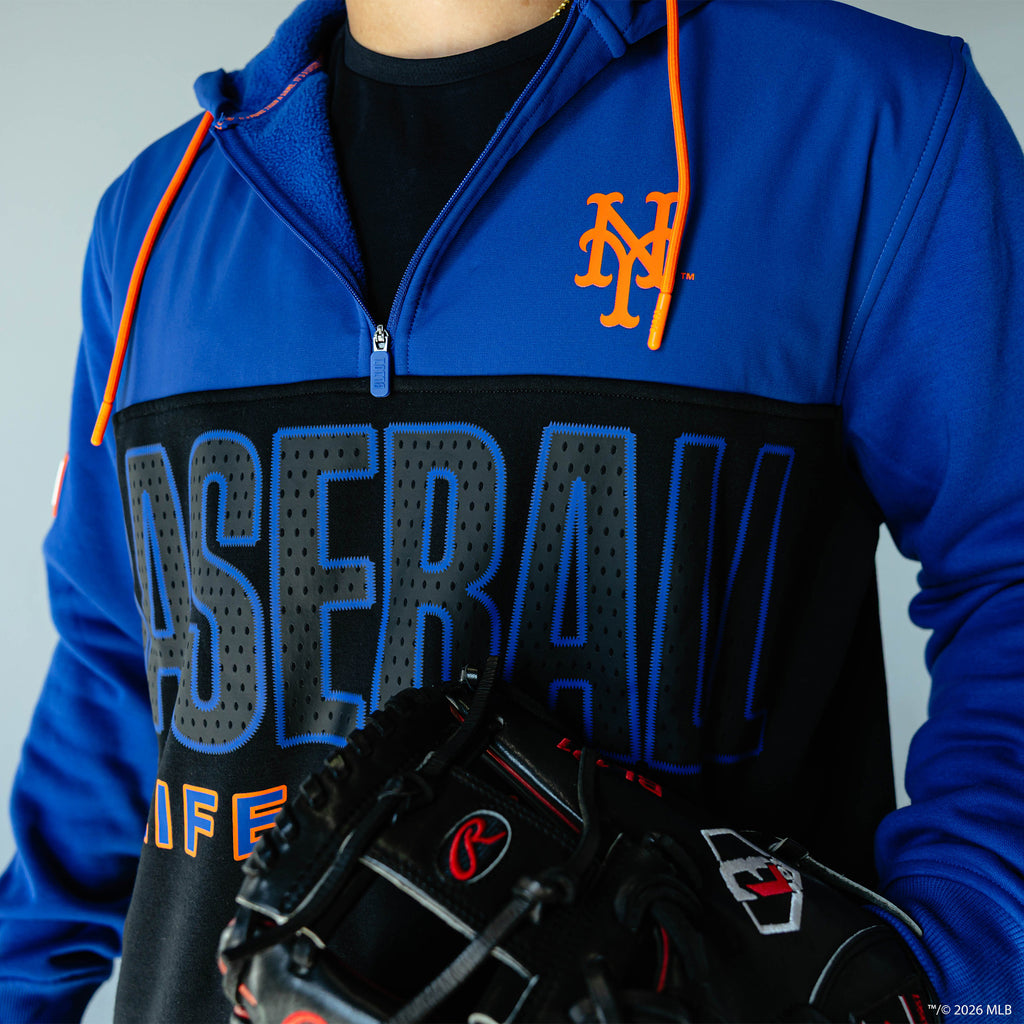Adult model wearing blue New York Mets Color Block quarter zip