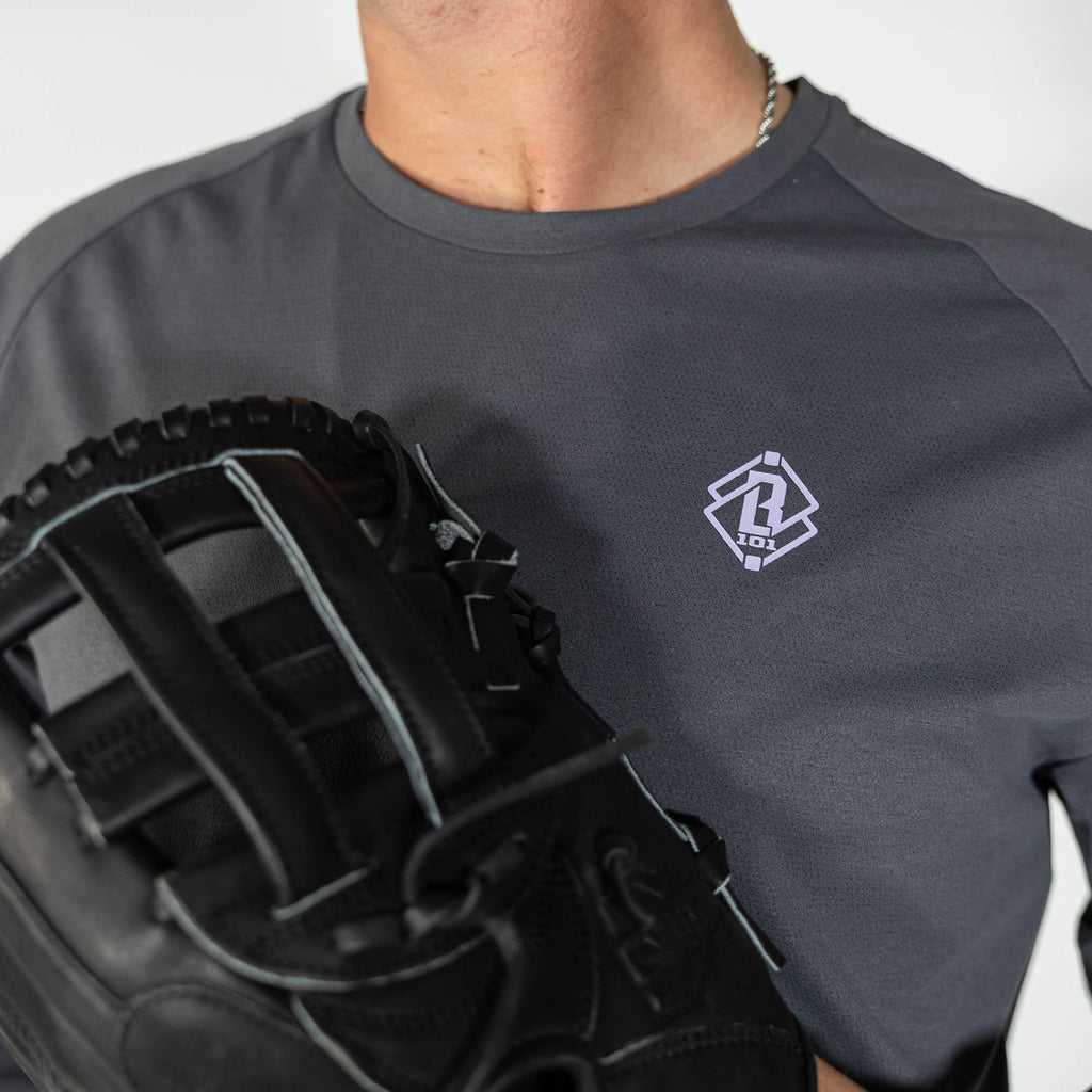 Adult model wearing gray and lilac Diamond Tech long sleeve