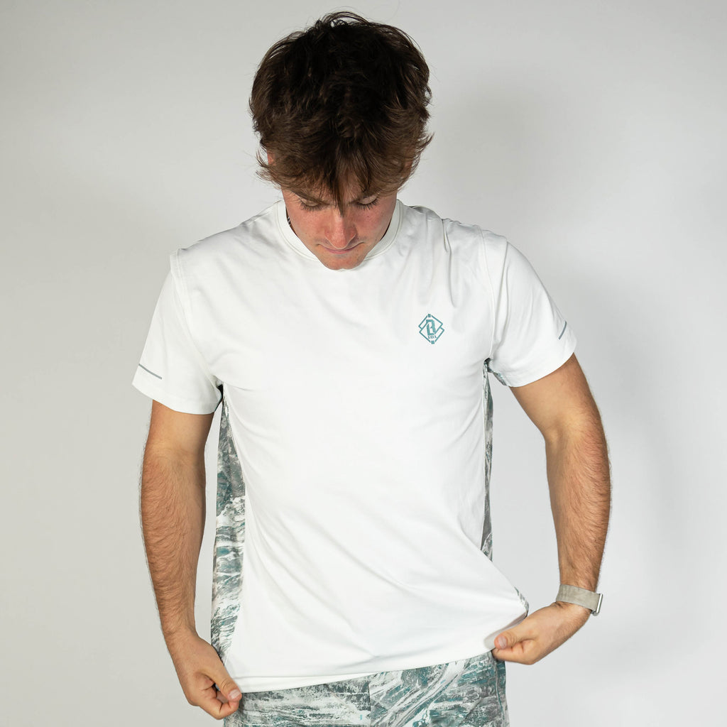 Adult model wearing white Realtree Aspect Diamond Tech Camo vented tee