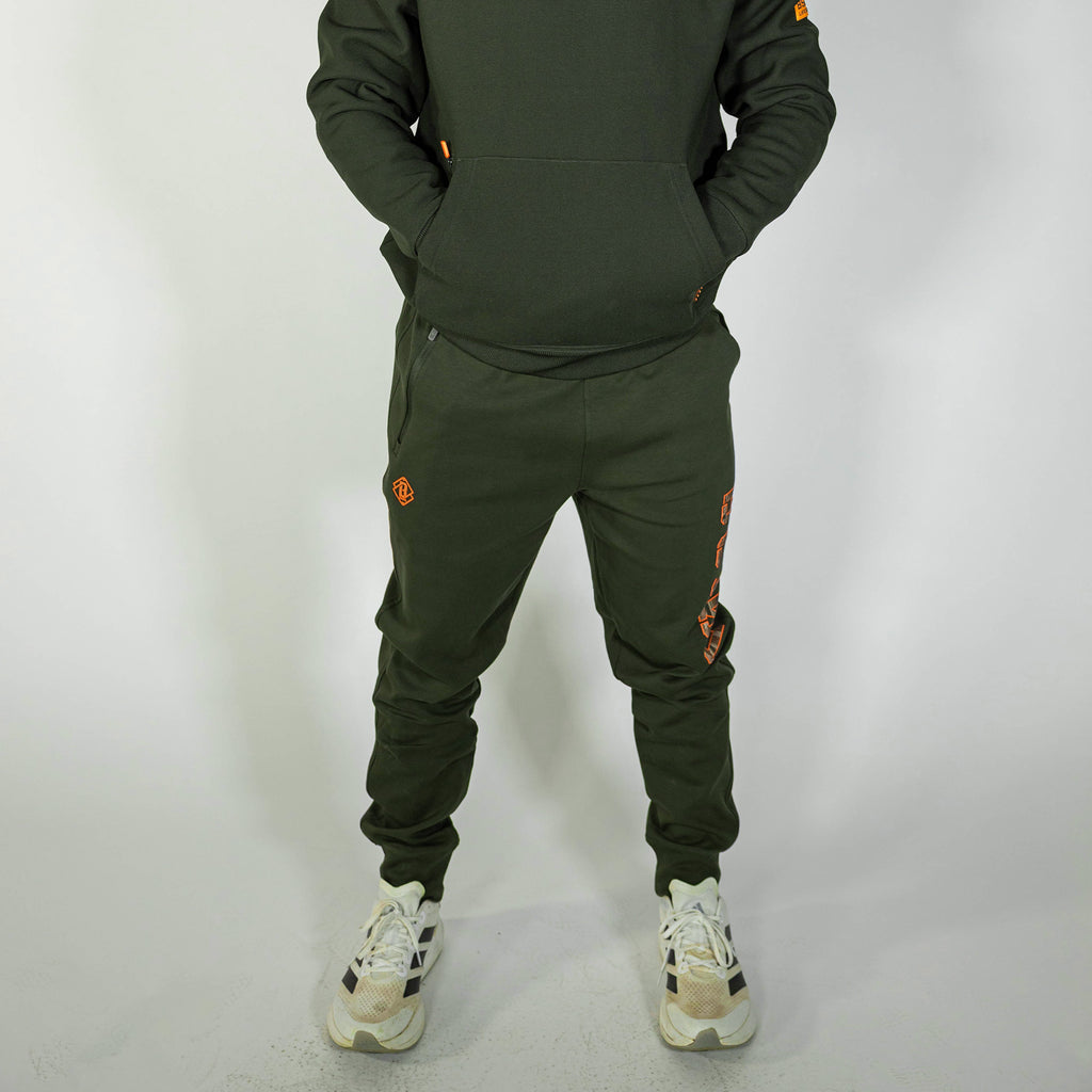 Adult model wearing green Realtree Legacy Diamond Relaxed Fit Camo joggers