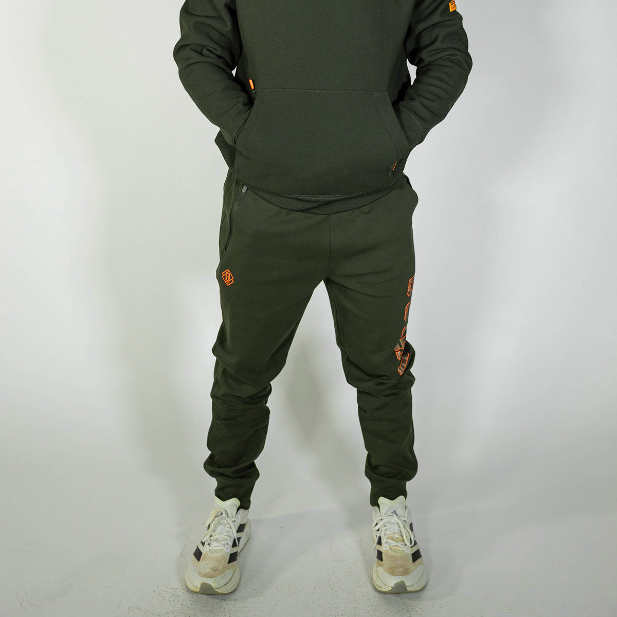 Adult model wearing green Realtree Legacy Diamond Relaxed Fit Camo joggers