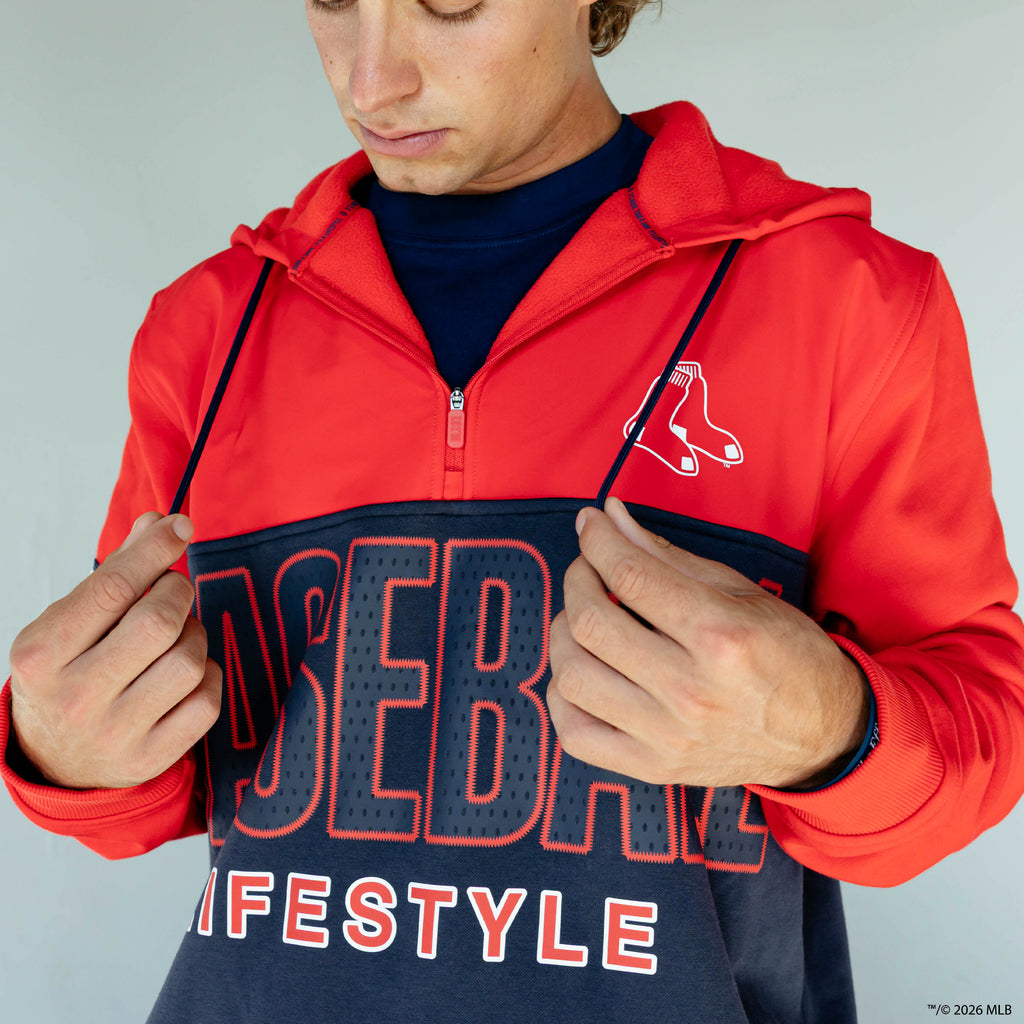 Adult model wearing red Boston Red Sox Color Block quarter zip