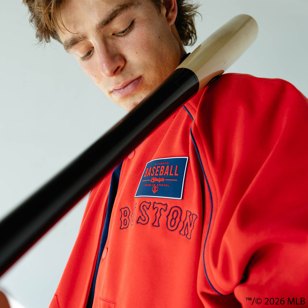 Adult model wearing red Boston Red Sox Stadium bomber jacket