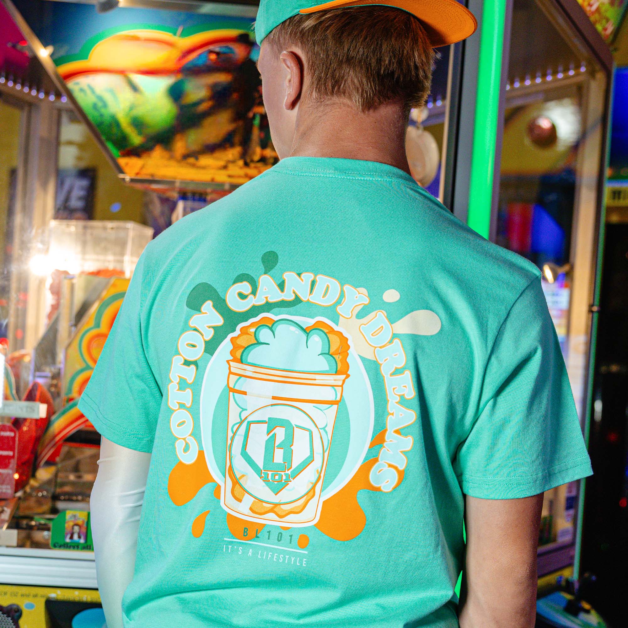 Adult model wearing Sweet Spot Tangerine Freeze graphic tee
