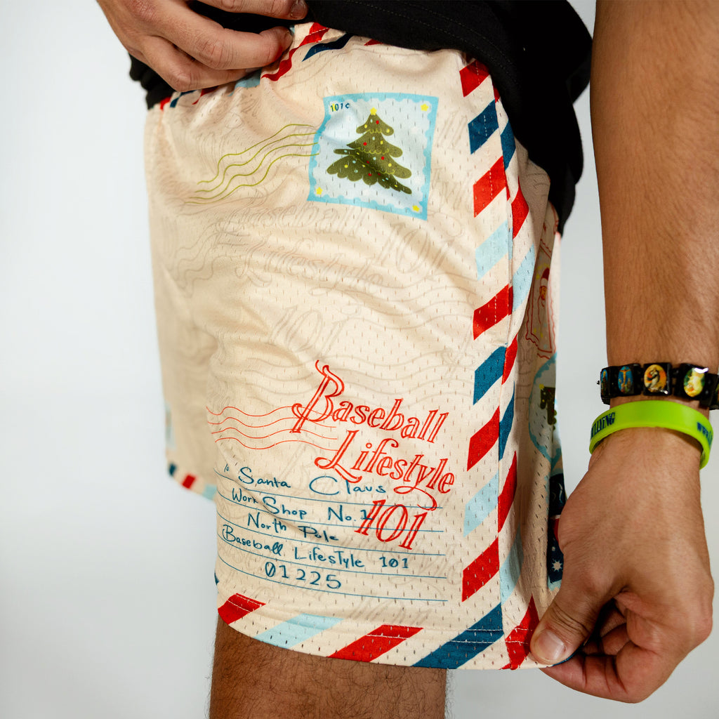 Adult model wearing white shorts with "Letter To Santa" design