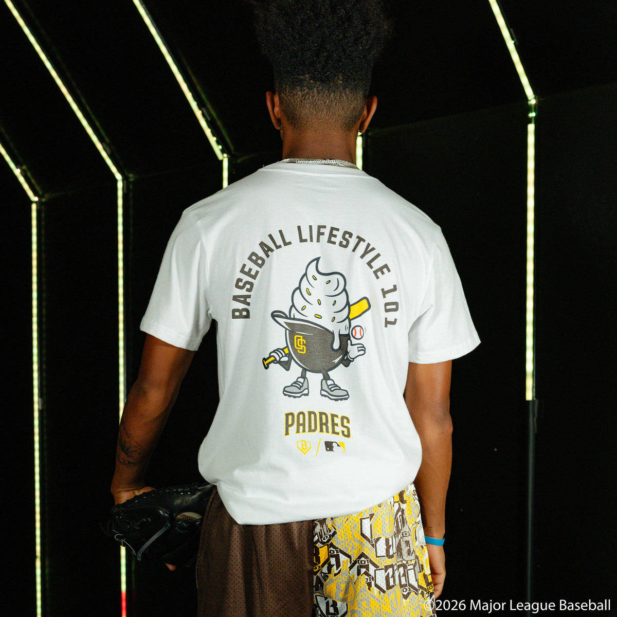 Adult model wearing white graphic tee with "San Diego Padres Ice Cream Cap" design