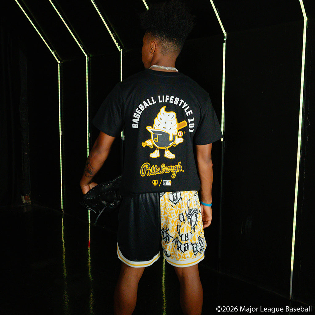 Adult model wearing black graphic tee with "Pittsburgh Pirates Ice Cream Cap" design
