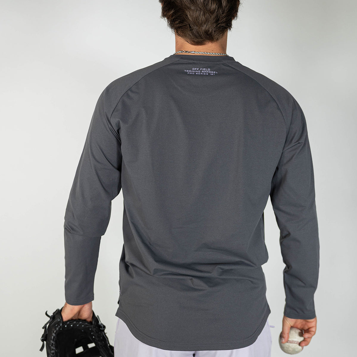 Adult model wearing gray and lilac Diamond Tech long sleeve