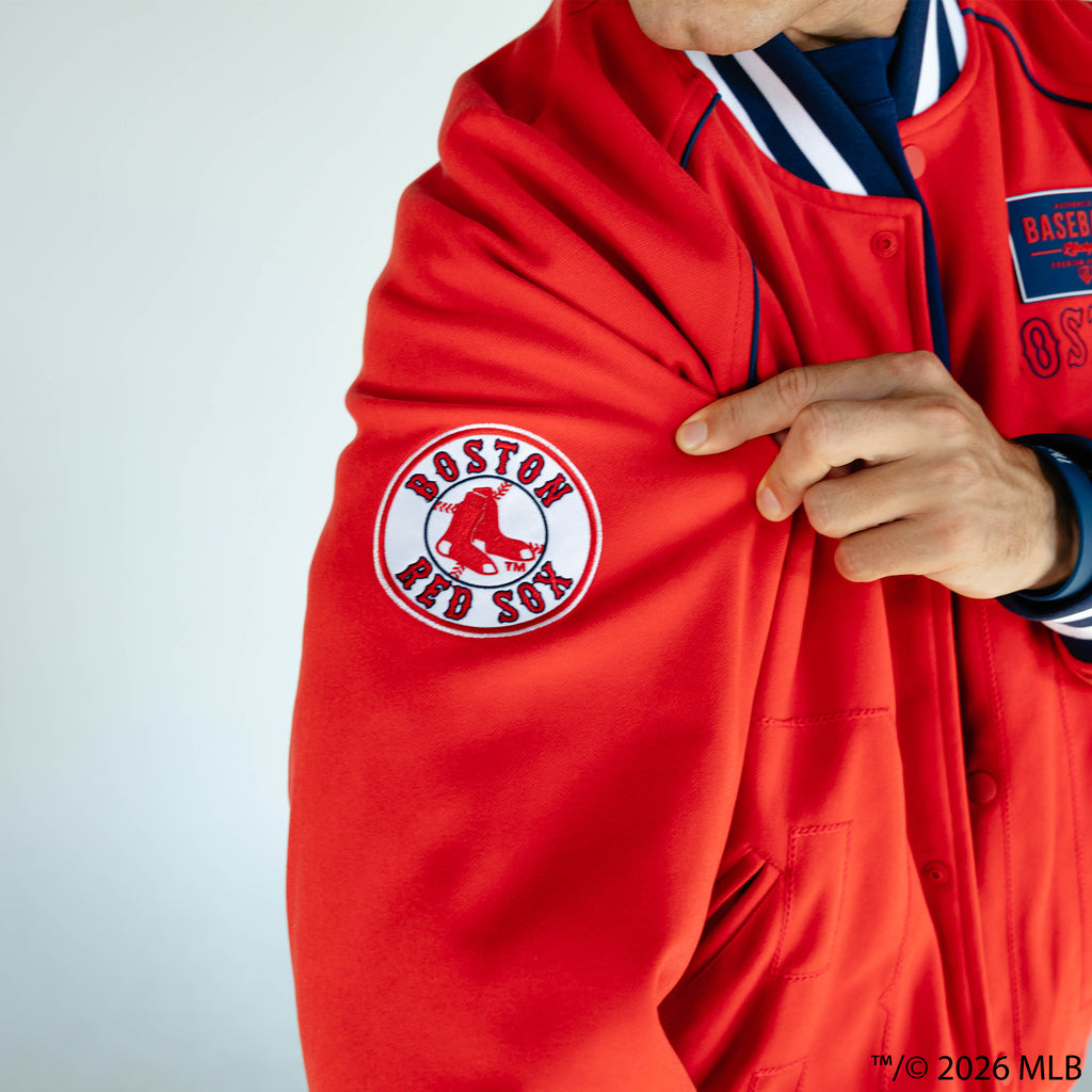 Adult model wearing red Boston Red Sox Stadium bomber jacket