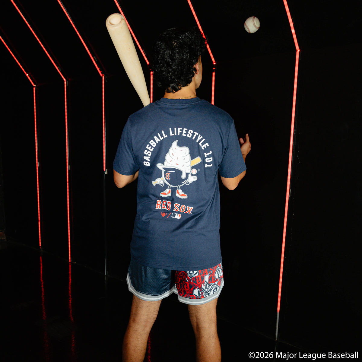 Adult model wearing navy graphic tee with "Boston Red Sox Ice Cream Cap" design