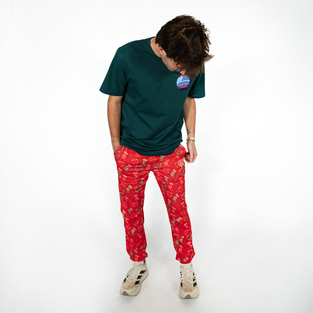 Adult model wearing red Stitched For The SZN pajama pants